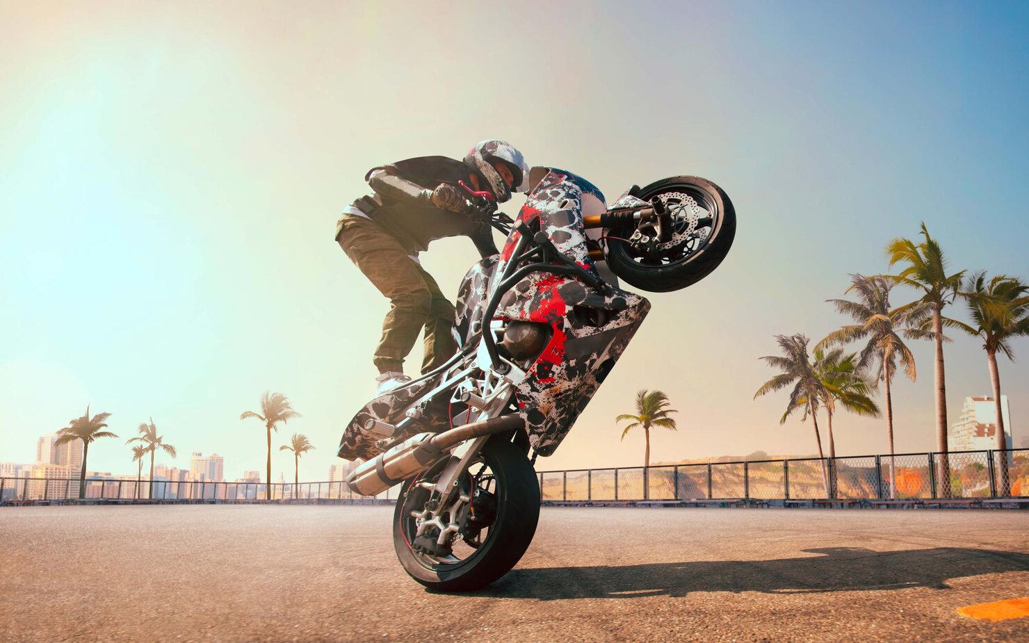 is doing a wheelie on a motorcycle illegal